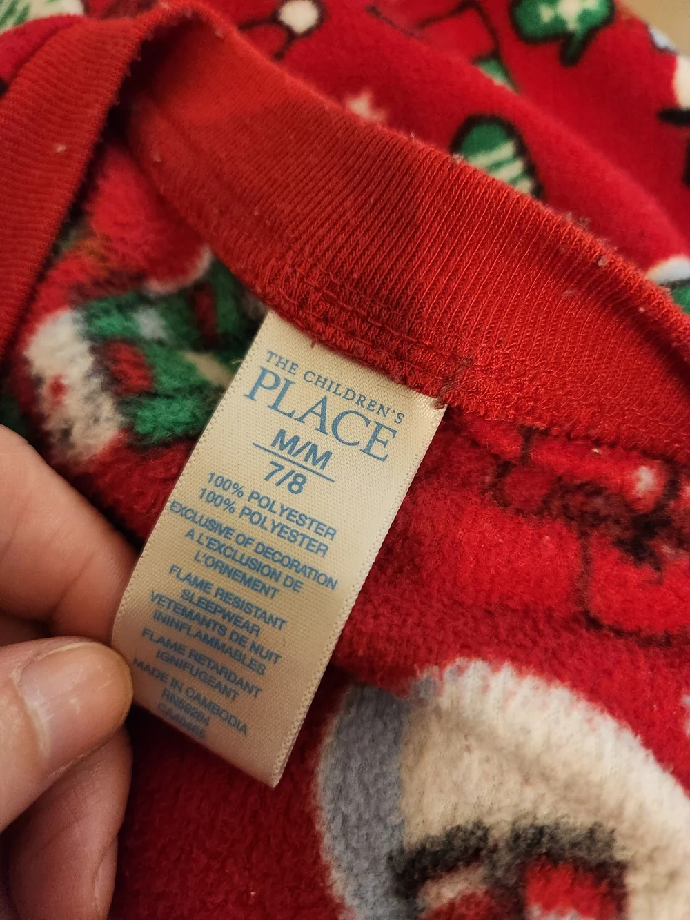The children's place size M 7 8festive red fleece onesie pajamas